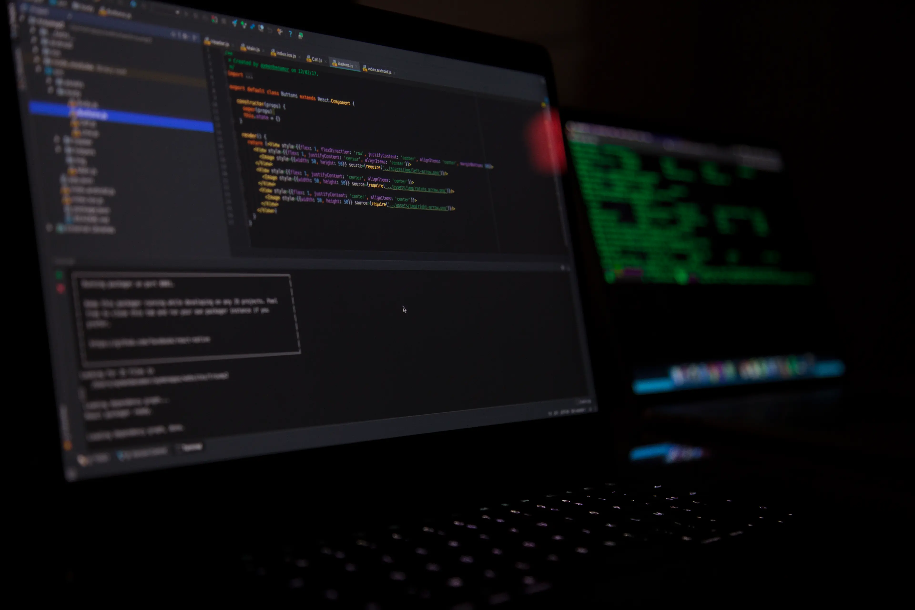 computer with lines of code